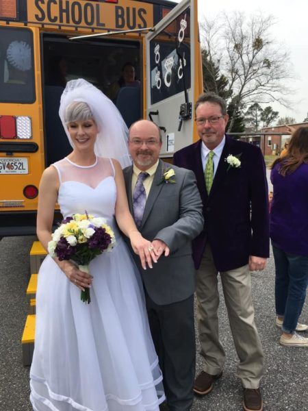 wedding by the a bus